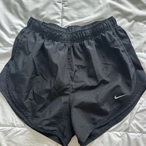 Black Nike running shorts